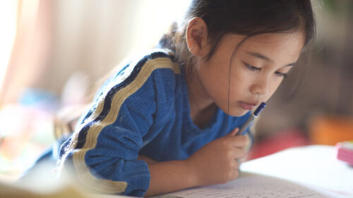 Child studying to improve test scores