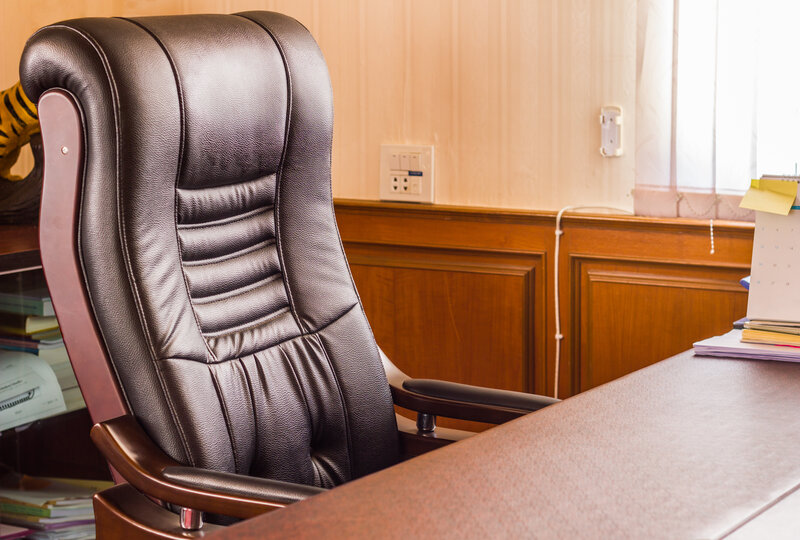 empty office chair; lack of Black leadership